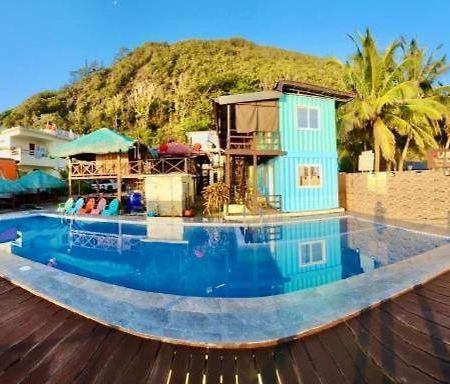Aura Marina Sands Beach Resort Baler Esterno foto