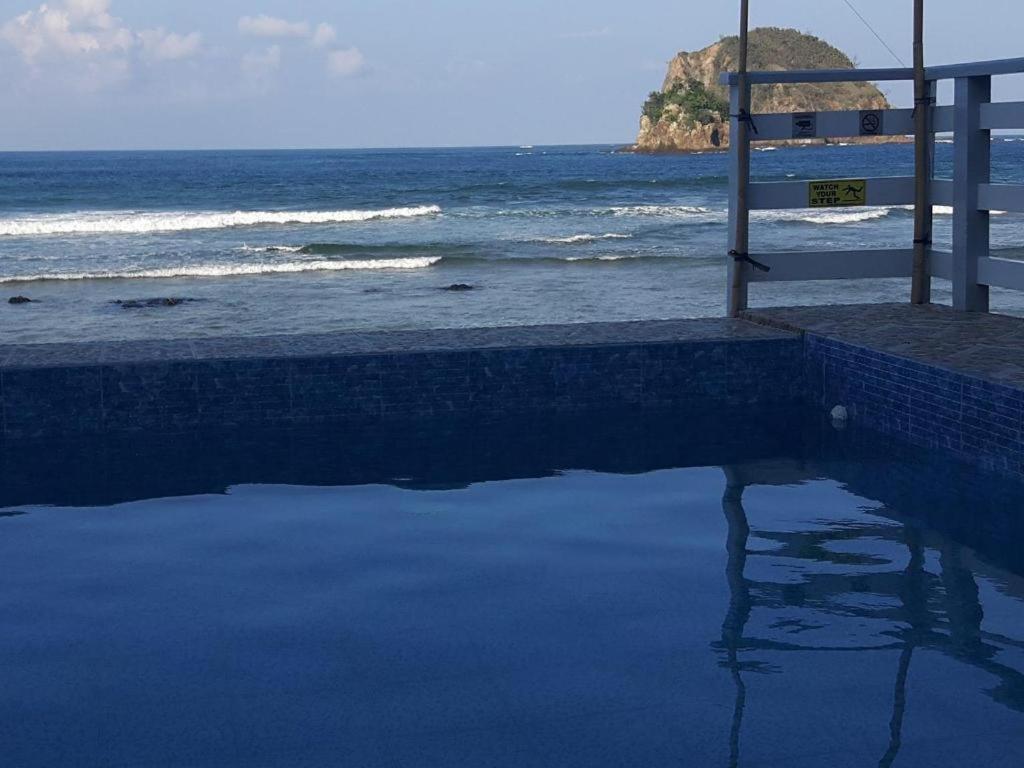 Aura Marina Sands Beach Resort Baler Esterno foto