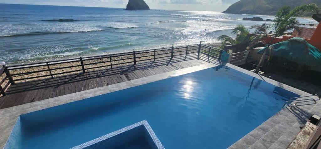 Aura Marina Sands Beach Resort Baler Esterno foto